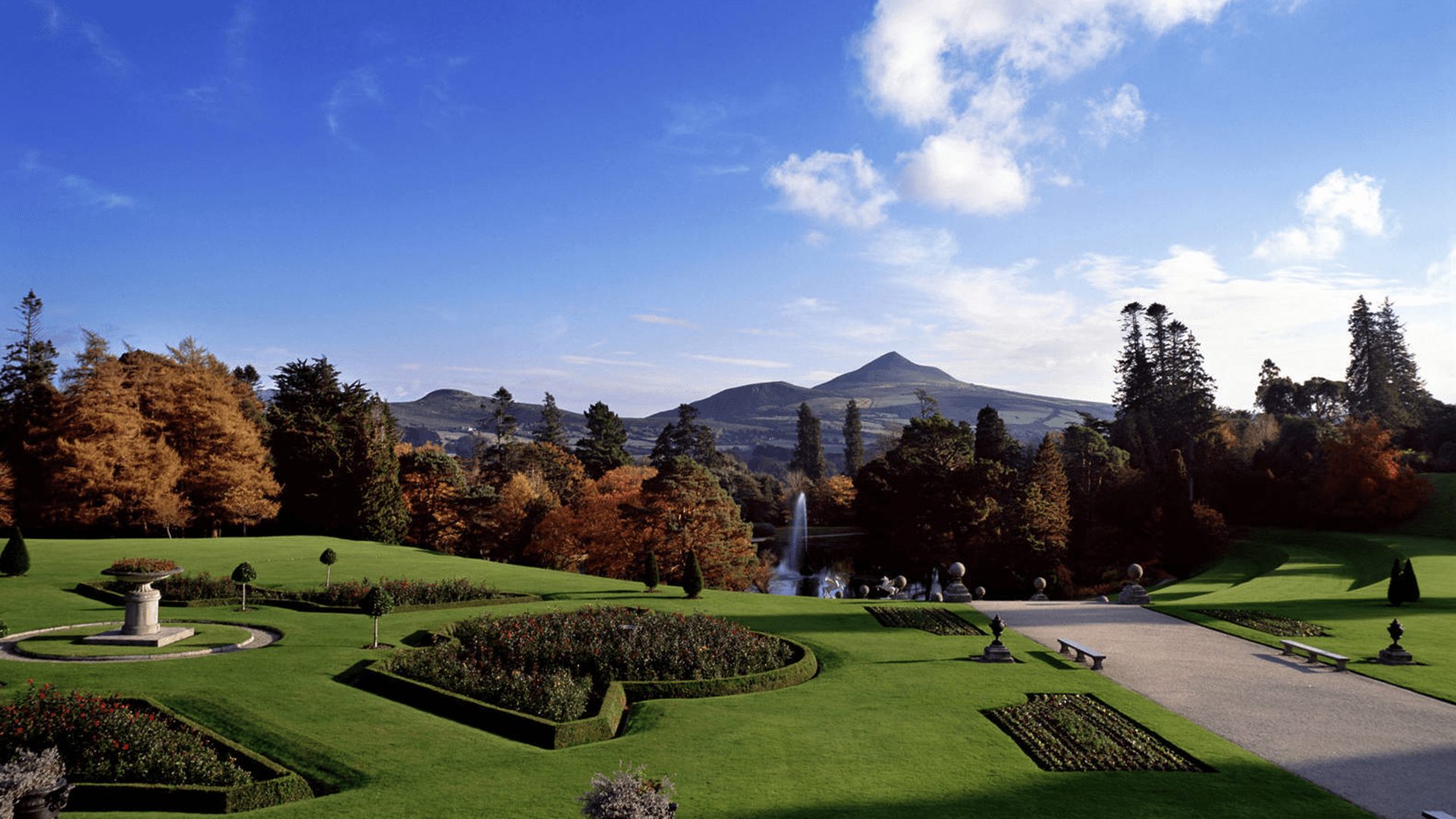 View of the Italian Garden i the Fall with Sugar Loaf Mountain in the background at the Powerscourt House and Gardens, Ireland